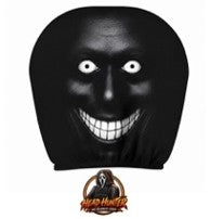 Headrest cover design - black face with white eyes and a wide toothy grin