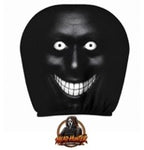 Headrest cover design - black face with white eyes and a wide toothy grin