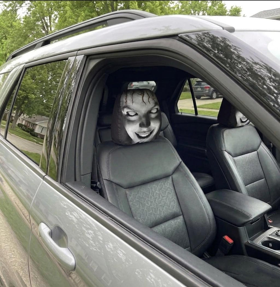 Customer photo of the headrest cover fitted in a car
